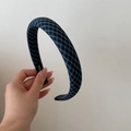 Detail shot of the blue plaid headband with non-slip lining and fabric brand label - Deep/Light Blue Stripes