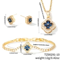Detailed view of blue clover jewelry set including necklace, bracelet and earrings - Gold Blue Zirconia Style (TZ00291-10)