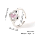 Anillo ajustable de plata con trébol de cuatro hojas de circón rosa y dimensiones - Flor de Circonia Rosa Plateada (R01071-4)
