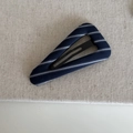 Detailed view of navy blue striped fabric cover on a triangular metal BB hair clip - Blue White Striped Large Triangle Clip