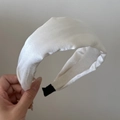 Detailed macro view of the thick white satin headband with a smooth silky texture finish - Bright White