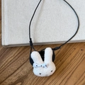 Detail of cute white plush rabbit accessory with blue polka dot bow on wooden table - White Rabbit Style (6#)