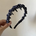 Detail of dark blue polka dot fabric headband with inner plastic grip teeth for secure hair - Non-Slip Toothed Headband / Navy Blue White Polka Dot Toothed Headband