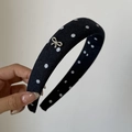 Close-up of thick denim headband with white polka dots and a small silver bow detail - 5# Black White Polka Dot Headband