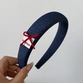 Detail of navy denim headband featuring small red bow and handmade fabric label - Wide Headband / Solid Navy Blue Wide Headband