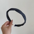 Close-up of blue and white plaid cross knot headband with anti-slip inner teeth - Navy White Striped Criss-Cross Style