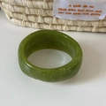 Close-up of green acrylic resin bangle with white marbled texture on white surface - Green (17# Large Irregular)