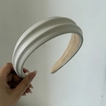 Close-up of white lychee texture leather headband with a padded thick design - 3# White PU Headband