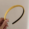 Detailed view of yellow corduroy headband texture with black anti-slip inner lining - Ginger Yellow
