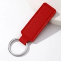 Minimalistischer roter Leder Schlüsselanhänger mit Litschi-Struktur und Silberring - Rechteck / Rot