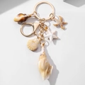 Close-up of ocean themed keychain with golden metal ring and resin starfish shell charms - Gold Hardware Starfish Scallop Style (款式四)