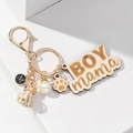 Llavero de madera BOY MAMA con borla blanca, amuleto de huella y perla elegante - Beige con Borlas