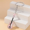 Portachiavi chitarra acustica rosa in acrilico con anello argento e incisione nome personalizzato - Rosa