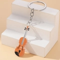 Portachiavi creativo a forma di violino in acrilico arancione con catena in metallo argento - Arancione