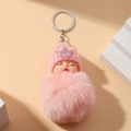 Rosa Plüsch-Schlüsselanhänger mit schlafender Puppe, Strickmütze und funkelnder Krone - Rosa