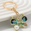 Exquisite gold butterfly keychain with blue-green enamel, pearls and crystals decor - Green and Blue Butterfly