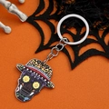 Bunter Tag der Toten Acryl Totenkopf Schlüsselanhänger mit Hut auf orangefarbenem Grund - Lila Zylinder Totenkopf Stil (款式2)