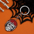 Detailansicht Halloween Acryl Totenkopf Schlüsselanhänger mit rotem Helm auf orangefarbenem Grund - Roter Helm Totenkopf Stil (款式3)