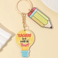 Rainbow pencil and bulb keychain with Teachers is a work of Heart text for teacher gift - Lightbulb Style