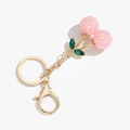 Detail of pink crystal cherry keychain with green leaves and gold lobster clasp - Green Leaf Pink