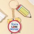 Rainbow pencil and clock keychain with Teach Love Inspire text for teacher appreciation - Alarm Style