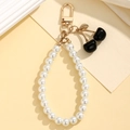 Creative pearl chain keychain with black cherry pendant for bags and airpods cases - Black