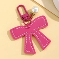 Exquisite rose red leather bow keychain with large faux pearl and metal clasp hanging - Rose Red