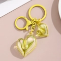 Close-up of yellow bubble heart charms with matching matte yellow metal hardware keychain - Yellow Dual Heart Style / Yellow