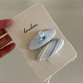 Mint blue striped bow and mesh flower hair clip set for girls on beige display card - Blue Striped Oval Blue Flower Pair