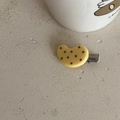 Detail of yellow resin bean hair clip with brown dots and silver metal duckbill clip - Bean Shape (1#) / Yellow Black Dots