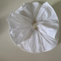 Detail view of large white pleated scrunchie showing cotton texture and stitching - White