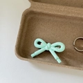 Detail of mint green hair clip with pink polka dots and silver metal duckbill base - Light Blue Bow White Polka Dot Thick Edge Clip