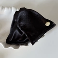 Close-up of a black velvet triangle hair claw clip with an elegant gold metal brand tag - Triangle / Black (3#)