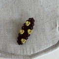 Elegante fermaglio per capelli marrone scuro con fiori gialli e strass scintillanti - Fermaglio Nero con Quattro Fiori Verdi