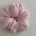 Detail of pink scrunchie with bubble texture and handmade heart label for ponytail styles - Pink Scrunchie