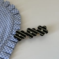 Detail of three blue floral acrylic hair clips with rhinestones and striped pattern - Black and White Stripe Triple Flower Hair Clip