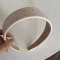 Close-up of pink polka dot headband with embroidered bow and anti-slip suede lining - Light Pink Polka Dot Embroidery Headband