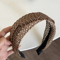 Detail of woven straw headband featuring intricate caramel braided texture and mesh design - Dark Color Straw Edge Cross Style