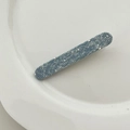 Light blue denim fabric hair clip featuring white rhinestone accents on a white plate - Light Denim Rhinestone Style