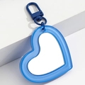 Detail of blue heart-shaped portable mirror charm with matching lobster clasp and mirror - Blue