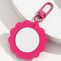 Détail du miroir de poche tournesol rose avec porte-clés sur bloc géométrique - Rose Rouge