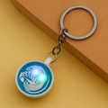 Detail of miniature coffee cup keychain with blue latte art and silver metal chain link - Blue (With Light)