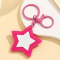 Dettaglio di un portachiavi a stella rosa con inserto bianco fai-da-te per stampa - Rosa Rosso