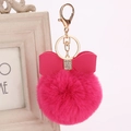 Schlüsselanhänger mit Fuchsie-Rex-Kaninchenfell, Strass-Schleife und Goldring - Fuchsia