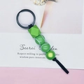 Portachiavi con perline a tema tennis con palline verdi e chiusura in metallo nero opaco - Pallina da tennis