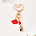 Portachiavi a cuore dorato con ciondolo labbra rosse smaltate e pendente rossetto brillante - Fibbia a Cuore Rossetto Labbra