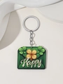 Detail view of St. Patrick’s Day green clover keychain with Happy text on white background - Green Happy Rectangular Charm Style (6)
