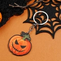 Halloween pompoen sleutelhanger met boosaardig gezicht en oranje metalen ring - Pompoen