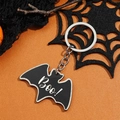 Halloween vleermuis sleutelhanger met Boo tekst op een oranje achtergrond - Vleermuis