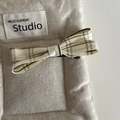 Detail of Korean style plaid bow hair clip featuring classic beige and brown patterns - Cream Yellow Striped Bow Hair Clip